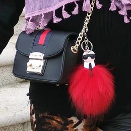 luxury logo Fluffy Karl Genuine Raccoon Fur Pompom Monster Bag Bugs Charm Keychain Plush Key Ring Leather Tassel Pompom integrity