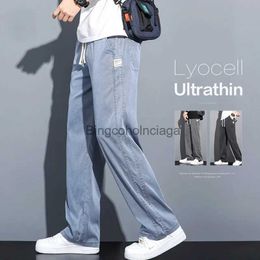 Jeans da uomo 2023 Nuovo morbido tessuto Lyocell Jeans da uomo Autunno sottili pantaloni larghi in denim dritto con coulisse vita elastica pantaloni casual coreaniL231003