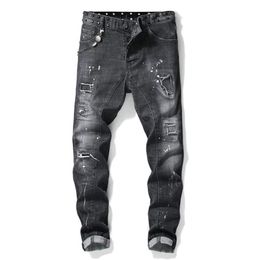 mens rivets stitching black jeans trendy streetwear slim stretch denim pants tattered splash paint hole jeans nails beggar pants2233