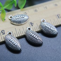 Whole 100pcs Rugby Football Charms Pendant Retro Jewelry Making DIY Keychain Ancient Silver Pendant For Bracelet Earrings 17 1249R