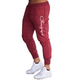 2022 Brand Joggers Casual Pants Fitness Men Sportswear Tracksuit Bottoms Skinny Sweatpants Trousers Black Gyms Jogger Track Pants259L