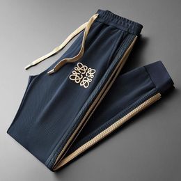 Pantaloni da uomo di design di lusso Loewee lettera ricamata pantaloni casual Loewe pantaloni da jogger monogramma cotone sciolto multi colore pantaloni da donna versatili 8117