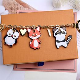 Fashion Cartoon Key Chain Bag Car Pendant Metal Hook With Gift Box Suitable For Men Ladies Children Designer Keychain2074