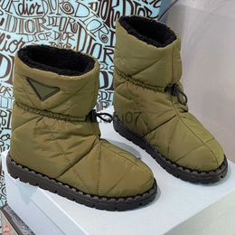Boots Padded nylon booties Inspired classic snow boots by compact lines sophisticated details rubber triangle completing design underlines its sporty character x