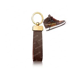 2023 Designer Keychain 65221 with sneaker Key Holder Buckle Car Keychain Handmade Leather Keychains Women Bags Pendant Accessories #KYHN-01 with box and dust bag