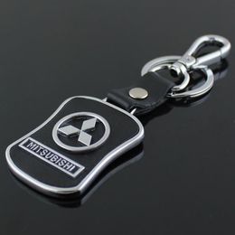 5pcs lot Top Fashion Car Logo keychain For Mitsubishi Metal Leather Keyring Key Chain ring Llaveros Chaveiro Car Emblem key holder292E