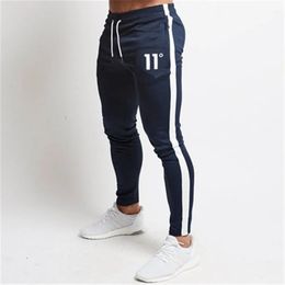 Mens Pants solid casual Mens Casual Slim Fit Tracksuit Sports Solid Male Gym Cotton Skinny Joggers Sweat Casual Pants Trousers 231007