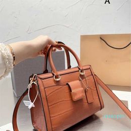 2023-style one shoulder diagonal carry on armpit women's bag magnetic button stone pattern killer small square fashion