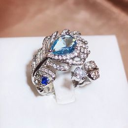 2023 Choucong Brand Handmade Wedding Rings Luxury Jewelry 925 Sterling Silver Fill Blue 5A Cubic Zircon CZ Diamond Party Women Promise Open Feather Ring Gift
