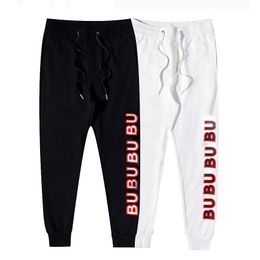Erkek pantolon tasarımcısı marka sonbahar pamuk desen baskılı siyah ve beyaz pantolon erkekler rahat spor giyim rengi koşu pantolon m-xxxl