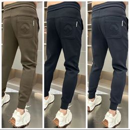 Uomini Jogging Marca Pantaloni maschili Pantaloni casual Pantaloni sportivi Jogger Moda autunno inverno Pantaloni sportivi allenamento Fitness Taglia asiatica M-5XL