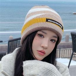 Knitted wool for women's autumn winter ear protection warm pile up fashionable versatile small and loose fitting pullover hat