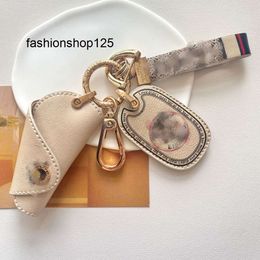 Jewelry Keychains & Lanyards Luxurys High leather Letter Printing Keychains Metal Handmade Unisex Designer bag car Key Ring