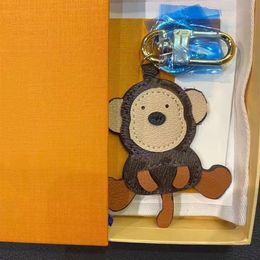 Lion Tiger Monkey Bear Keychains Luxury Designer Leather Key Chain Laser Embossed Bag Pendants With Box 18532383