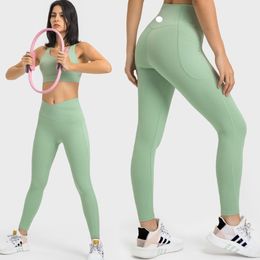 LU-720 Spring and summer new cross-waist sports tights women's double side pocket no T line yoga pants