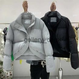 Women's Down Parkas 2023 winter new down jacket women's short high-end goose down bread suit foreign air profile thickened magnetic coat J2301011