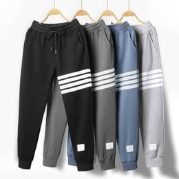 Sports pants men's pure cotton spring and autumn pants winter plush and thickened loose fitting leggings four bar lovers' sanitary pants