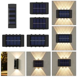 4 Pack Solar Wall Lights Outdoor, Waterproof Outdoor Solar Fence light Up and Down for Garden Decoration, Fence, Yard, Front Door, Pathway