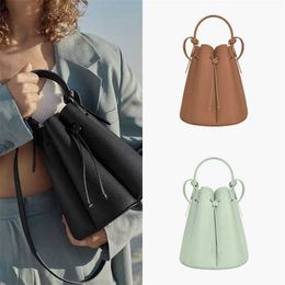 Fahsion Shoulder Bags Leather Designer Crossbody Bags French Niche Bucket Bags Womens Petal Pleated Pole Tote Bag Handbag 230316