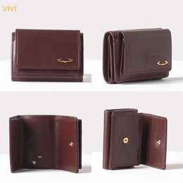 Trifold Card Bag Vivi Cowhide Card Bag Ladies designer Wallet Purse Solid Color Handheld Saturn Wallets Leather For Men Women