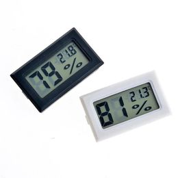 vendita all'ingrosso mini termometro digitale per ambiente LCD bianco / nero, igrometro, misuratore di temperatura di umidità nella ghiacciaia del frigorifero in camera. Spedizione gratuita