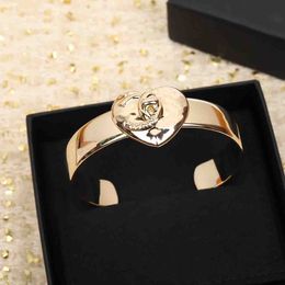 2023 Luxury quality charm opened bangle with heart shape in 18k gold plated have stamp wide design PS4659A