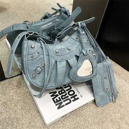 Women's Bag 2023 New Locomotive Underarm Rivet Tassel Three in One Fold Single Shoulder Crossbodycode 2879