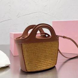 2024 High Repurchase Rate Beach Vacation Outdoor Womens Cowhide Woven Bag Brown White Two Handed Handle Single Shoulder Crossbody Handbag Brand Casual Fashion
