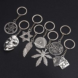 Personalised and fashionable hip-hop keychain six pointed star mask wings metal pendant round label trendy men's creative gift