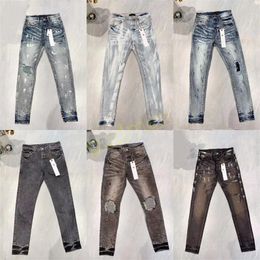 Designer maschi jeans viola in denim pantalone motociclista strappato jean slim fit motocicle