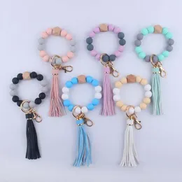 Keychains Fashion Wristlet Bracelet Keychain Food Grade Silicone Wood Beaded Keyring Women Girl Lobster Clasp Tassel Accessories