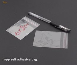 promotion real 1000pcs clear resealable bopp poly cellophane bag 6x8cm transparent opp gift bags plastic packaging self adhesive s2989015