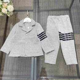 luxury designer baby Tracksuits KIds formal dress Size 100160 CM 2pcs Polo collar long sleeved suit and striped decorative elastic waist pant