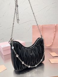 Chain style bag adds a touch of sophistication to the girlish feel, making it practical and versatile