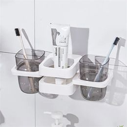 Toothbrush Holders Mouthwash Cup Bathroom Non-perforated Foldable No Mark Adhesive Wall-mounted Bathroom Shower Shelf Toothbrush Holder Creative 231013