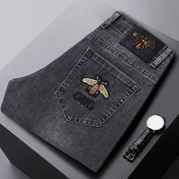 Fashion Spring Mens Slim Elastic Jeans Bee Embroidery Business Denim Pants Classic Style2658