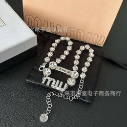 Autumn New High Edition Miao Family Complete Copper Inlaid Diamond K Gold Electroplated Necklace MIu Texture Pop Up Letter