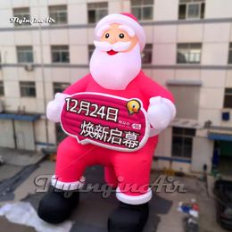 Outdoor Christmas Decorations Giant Red Inflatable Santa Claus Saint Nicholas Figure Model Holding A Advertising Banner For Promotion Event