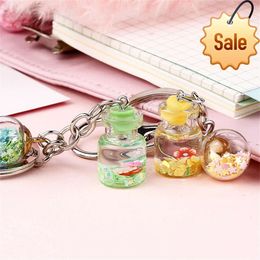 Cute Flower Quicksand Bottle Keychain With Sequin Ball Women Girl Bag Pendant Decoration ing Bottle Car Keys Accessories