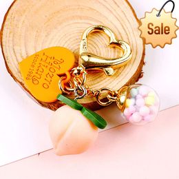 Lovely Peach Key Chain Creative Fruit Pendant Keyring Accessories Women Girl Exquisite Gift Colorball Mobile Phone Keychains