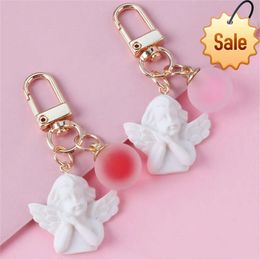 Fashion Charm White Wing Angel Keychain Jelly Colour Ball Accessories Car Bag Pendant Earphone Case Ornament Good Gift for Women