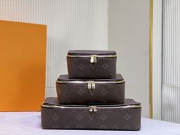 Designer marrom flor caixa de jóias feminina couro genuíno caso de armazenamento de viagem caixa de saco de maquiagem novo conjunto moda bagagem caso monogramas m43690 m43689 m43688
