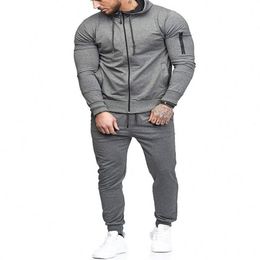 Designer High Quality Mens Tracksuit Men's Sports Suit Arm Zipper Decoration Fitness Long Pants 2pcs Clothing Sets283k