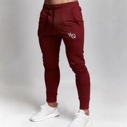 2019 New fashion Men Spring Pencil Pants Gyms clothing in men pants Skinny casual trousers pants top quality sweatpants267a