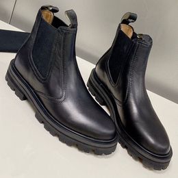 MARGARE CHELSEA BOOT IN CALFSKIN BLACK TRIOMPHE BOOT SIGNATURE BULKY BUCKLED BOOTS calfskin lining 3434 Luxury brand boots elegant casual boots Martin Boots