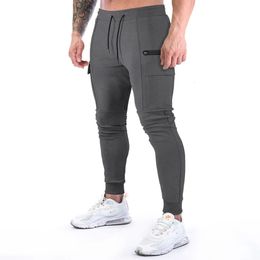 Men's Pants Grey Sports Pants Men's Muscle Fitness Cargo Pants Running Training Gym Bodybuilding Pockets Trousers Black Jogging Pants 231019