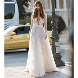 Arabic Crystals Sequins A Line Wedding Dresses Ball Gown V Neck Sheer Long Sleeves Bling Sparkly Dubai Garden Bridal Gowns Court Train 328 328