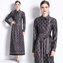 Abito lungo a maniche lunghe Designer donna Nero Risvolto Fiocco con cintura Abiti eleganti a pieghe 2023 Autunno Inverno Moda Stampa Lady Slim A-Line Abiti da vacanza Abiti da festa