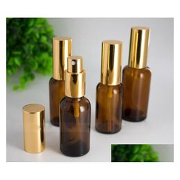 Packing Bottles Wholesale Empty Glass Essential Oil Per Bottles Amber Refillable Mist Spray Bottle 5-100Ml With Gold Cap Office School Dhcjy