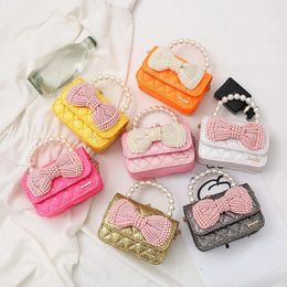 Handbags Kids Mini Purse Cute Bow Crossbody Bags for Girls Pearl Tote Hand Bags Baby Coin Pouch Clutch Bag Toddler Purse 231021